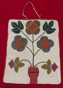 Naative American Beaded Bag white backgrounf with flowers in vase Native American Beaded Bag